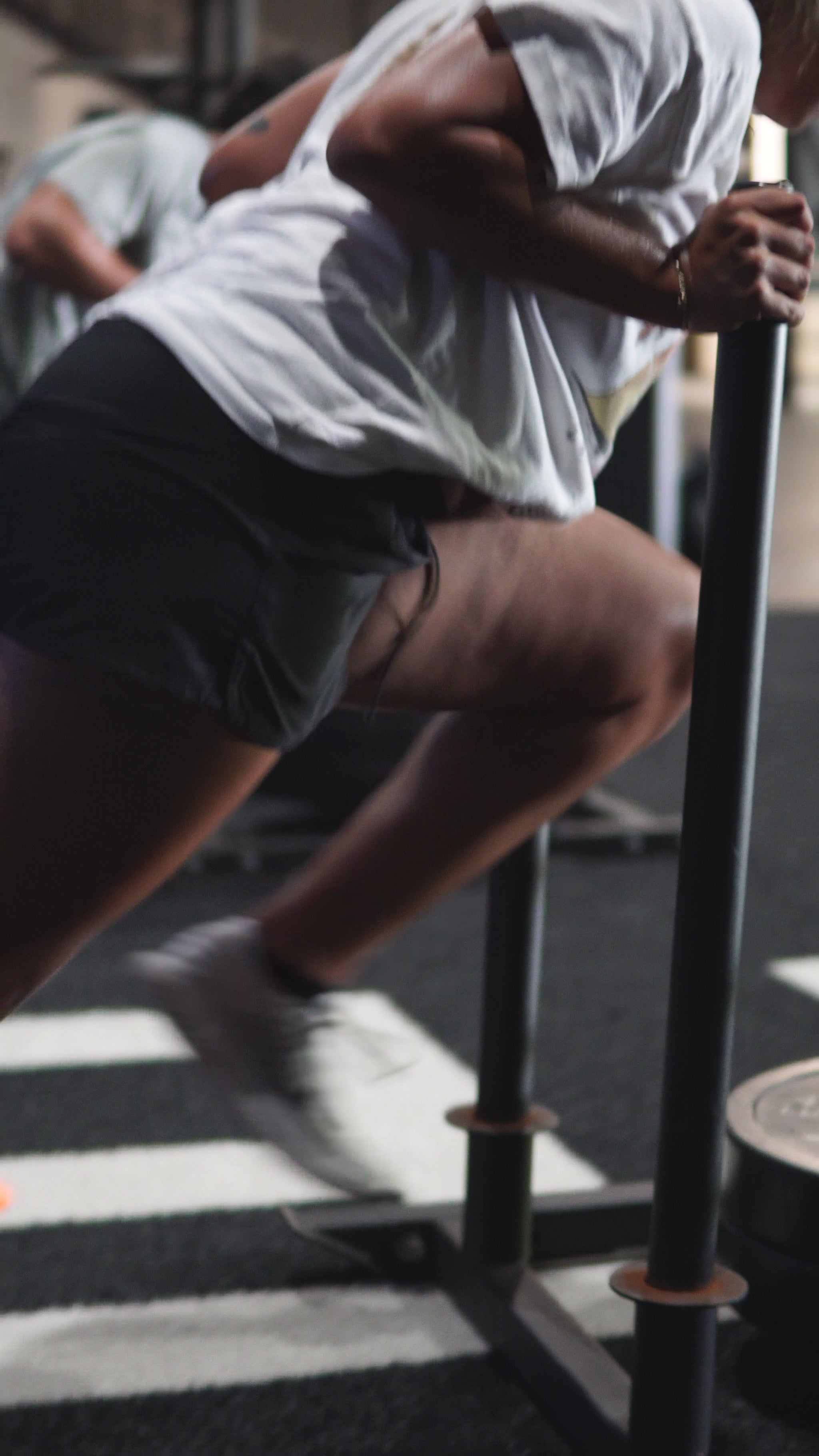 Athlete performing sprint technique drill to improve stride length and frequency for faster times